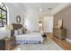 Bright main bedroom with vaulted ceiling, neutral tones, and ample natural light at 13124 Filly Ct, Windermere, FL 34786
