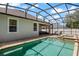 View of backyard swimming pool, patio, spa, comfortable lounge chairs, and partial view of patio seating area at 13609 Riggs Way, Windermere, FL 34786