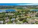 Scenic aerial shot showcases homes near serene lakes and lush green spaces at 1375 Willow Wind Dr, Clermont, FL 34711