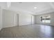 Bright bedroom offers luxury vinyl plank flooring, large window and tray ceiling at 1375 Willow Wind Dr, Clermont, FL 34711