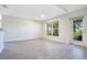 Bright bonus room with sleek floors, large windows and light-filled interiors at 1375 Willow Wind Dr, Clermont, FL 34711