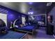 Whimsical themed bedroom featuring a starry design, three twin beds, and a TV at 1425 Thunderbird Rd, Davenport, FL 33896