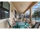 Relaxing outdoor patio with comfortable seating and view of the pool at 1425 Thunderbird Rd, Davenport, FL 33896