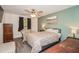 Comfortable bedroom with a soft chair, window, and complemented by neutral tones at 150 Waterfall Way # 102, Altamonte Springs, FL 32714