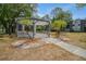 Charming community gazebo offers a tranquil spot amidst palm trees and well-maintained grounds at 150 Waterfall Way # 102, Altamonte Springs, FL 32714