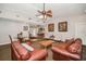 Comfortable living area featuring cozy seating, stylish decor, and an open layout connecting to the dining area at 150 Waterfall Way # 102, Altamonte Springs, FL 32714