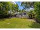 A backyard view showcases the home's exterior and outdoor living space at 2020 Palmer St, Orlando, FL 32803