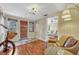 Entry way featuring natural hardwood flooring, a bike, with views into the living room at 2020 Palmer St, Orlando, FL 32803