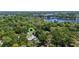 Discover your private oasis nestled among the trees with an inviting backyard pool at 203 E Greentree Ln, Lake Mary, FL 32746
