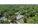 Expansive wooded property featuring a pool, tennis court, and location pin at 203 E Greentree Ln, Lake Mary, FL 32746