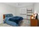 Bright bedroom with carpet and ceiling fan and lots of space for relaxing and quiet time at 203 E Greentree Ln, Lake Mary, FL 32746