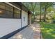 Charming home exterior with well-manicured landscaping and walkway at 203 E Greentree Ln, Lake Mary, FL 32746