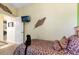 Neutral bedroom with fun animal print bedding and decorative wall hangings at 2302 Silver Palm Dr # 203, Kissimmee, FL 34747