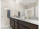This bathroom features double sinks and a vanity at 2405 Standing Rock Cir, Oakland, FL 34787