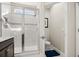 This bathroom features a tiled shower and vanity at 2405 Standing Rock Cir, Oakland, FL 34787