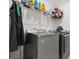 This laundry room includes a washer and dryer at 2405 Standing Rock Cir, Oakland, FL 34787