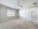 Bedroom with carpet and a ceiling fan at 2636 Grand Central Ave, Tavares, FL 32778