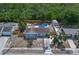 Charming home featuring a private pool, fenced yard, shed, and lush surrounding greenery at 2763 E Waco Dr, Deltona, FL 32738
