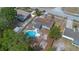 A captivating aerial shot showcasing the home, pool, and spacious fenced-in backyard at 2763 E Waco Dr, Deltona, FL 32738