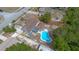 This house has a beautiful pool and fenced-in backyard, all captured from a high vantage point at 2763 E Waco Dr, Deltona, FL 32738