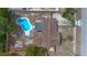 This aerial view captures a well-maintained property, including a pool, and generous backyard space at 2763 E Waco Dr, Deltona, FL 32738