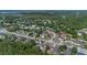 An aerial view shows houses in a well-established neighborhood close to local amenities and green spaces at 2763 E Waco Dr, Deltona, FL 32738