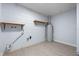 Unfinished basement space with essential utilities like a water heater at 2763 E Waco Dr, Deltona, FL 32738