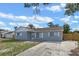 Well-maintained single-story home with a concrete driveway and fresh exterior paint at 2763 E Waco Dr, Deltona, FL 32738
