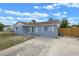 Well-maintained single-story home with updated exterior finishes and a concrete driveway at 2763 E Waco Dr, Deltona, FL 32738