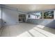 Screened patio featuring tile flooring and sliding glass doors at 2763 E Waco Dr, Deltona, FL 32738