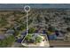 Aerial view of property lines in a mature, planned community with well-kept homes at 2995 White Magnolia Loop, Clermont, FL 34711