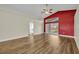 Main bedroom features wood flooring, with an ensuite bathroom that provides a private and relaxing retreat at 314 Lady Diana Dr, Davenport, FL 33837