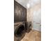Efficient laundry room with a side-by-side washer and dryer for convenience at 3333 Messina Dr, Lake Mary, FL 32746