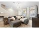 Cozy living room with neutral decor, a comfortable couch, and natural light at 3333 Messina Dr, Lake Mary, FL 32746