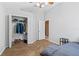 Bedroom boasting a ceiling fan, large closet, and neutral paint at 346 Hickory Springs Ct, Debary, FL 32713