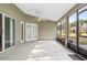 Relaxing screened patio perfect for enjoying the outdoors with views of the surrounding neighborhood at 346 Hickory Springs Ct, Debary, FL 32713