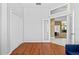 Bright room with wood floors, a ceiling fan, a large window and closet at 346 Hickory Springs Ct, Debary, FL 32713