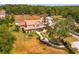 Expansive property featuring a traditional home and a separate garage at 36408 E Eldorado Lake Dr, Eustis, FL 32736