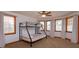 Cozy bedroom with bunk beds, perfect for a room or guest room at 36408 E Eldorado Lake Dr, Eustis, FL 32736