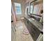 Bathroom featuring a granite countertop vanity with a shower/tub combo at 405 Bella Vida Blvd, Orlando, FL 32828