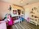 bedroom featuring a custom bunk bed with playhouse design and chandelier lighting at 405 Bella Vida Blvd, Orlando, FL 32828