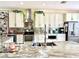 Well-equipped kitchen with stainless steel appliances, mirrored backsplash, and decorative accents at 405 Bella Vida Blvd, Orlando, FL 32828