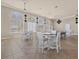 Spacious game room featuring tables, chairs, and expansive windows at 411 Cabello Dr, Davenport, FL 33837