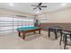 Game room with painted walls, foosball table and pool table; ready for entertainment at 411 Cabello Dr, Davenport, FL 33837