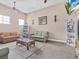 Welcoming living room with couches, bookshelves, and cozy decor at 411 Cabello Dr, Davenport, FL 33837