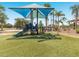 A playground featuring a green slide, climbing structure, and soft turf surface for fun activities at 411 Cabello Dr, Davenport, FL 33837