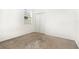 Small empty carpeted bedroom with a double closet and single window at 4351 Finch Ln, Kissimmee, FL 34746