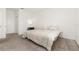 Neutral bedroom features a queen size bed, soft carpet and white walls at 4351 Finch Ln, Kissimmee, FL 34746