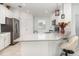 Bright kitchen featuring a breakfast bar, stainless steel appliances, and ample counter space at 4351 Finch Ln, Kissimmee, FL 34746