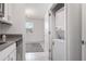 Convenient laundry area with stackable washer and dryer located near the kitchen and living area at 4351 Finch Ln, Kissimmee, FL 34746